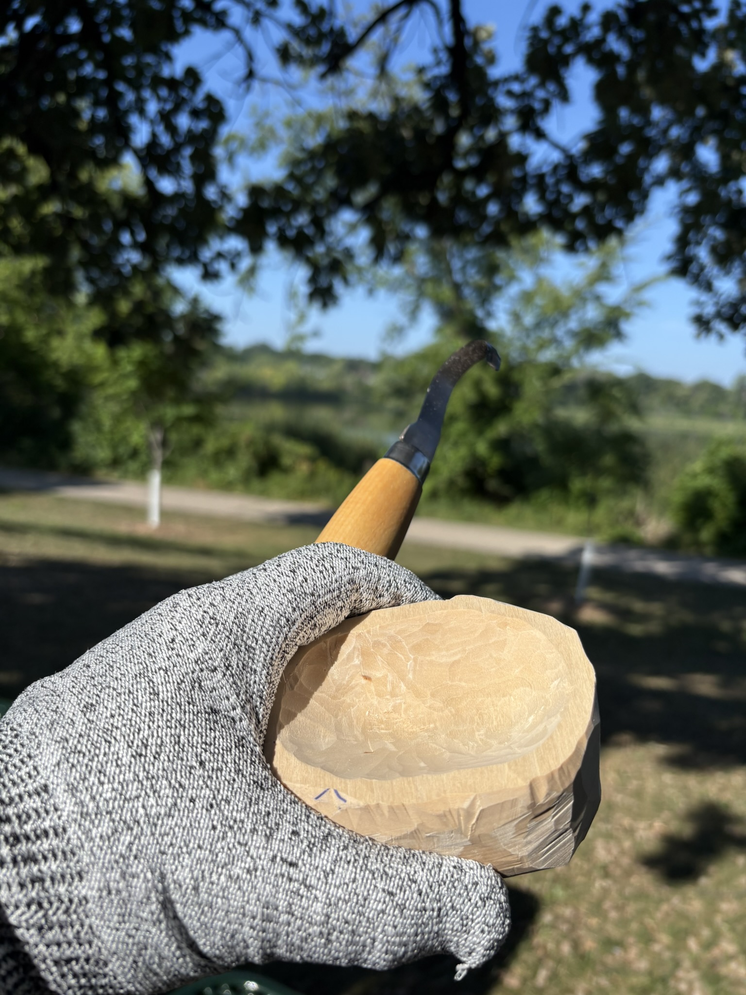 Carving outdoors in the park.